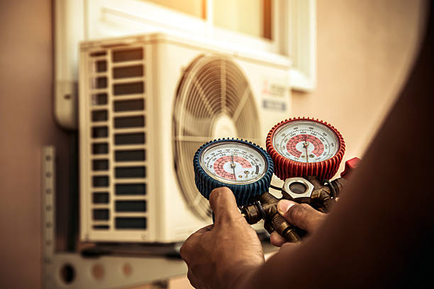 Professional Heat Pump Repair technician working in Bloomfield, IN